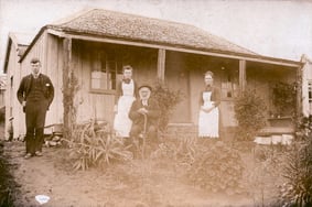 William Cowling and family in the garden of their home, Hurdon, New Plymouth.
